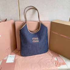 미우미우 스티치 로고 탑핸들 토트백 5BG231-2984