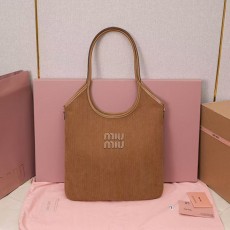 미우미우 스티치 로고 탑핸들 토트백 5BG231-2986
